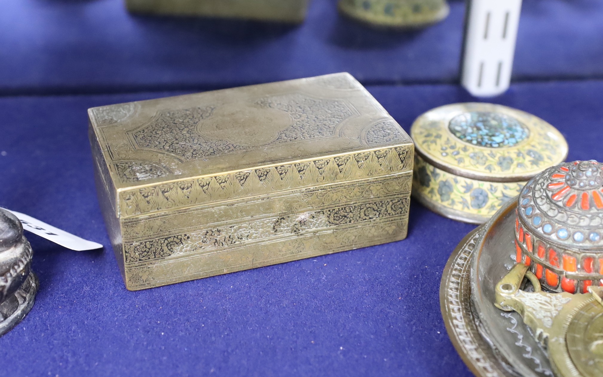 A group of Indian & Islamic items: an astrolobe, betel nut cutters, three bones and two dishes